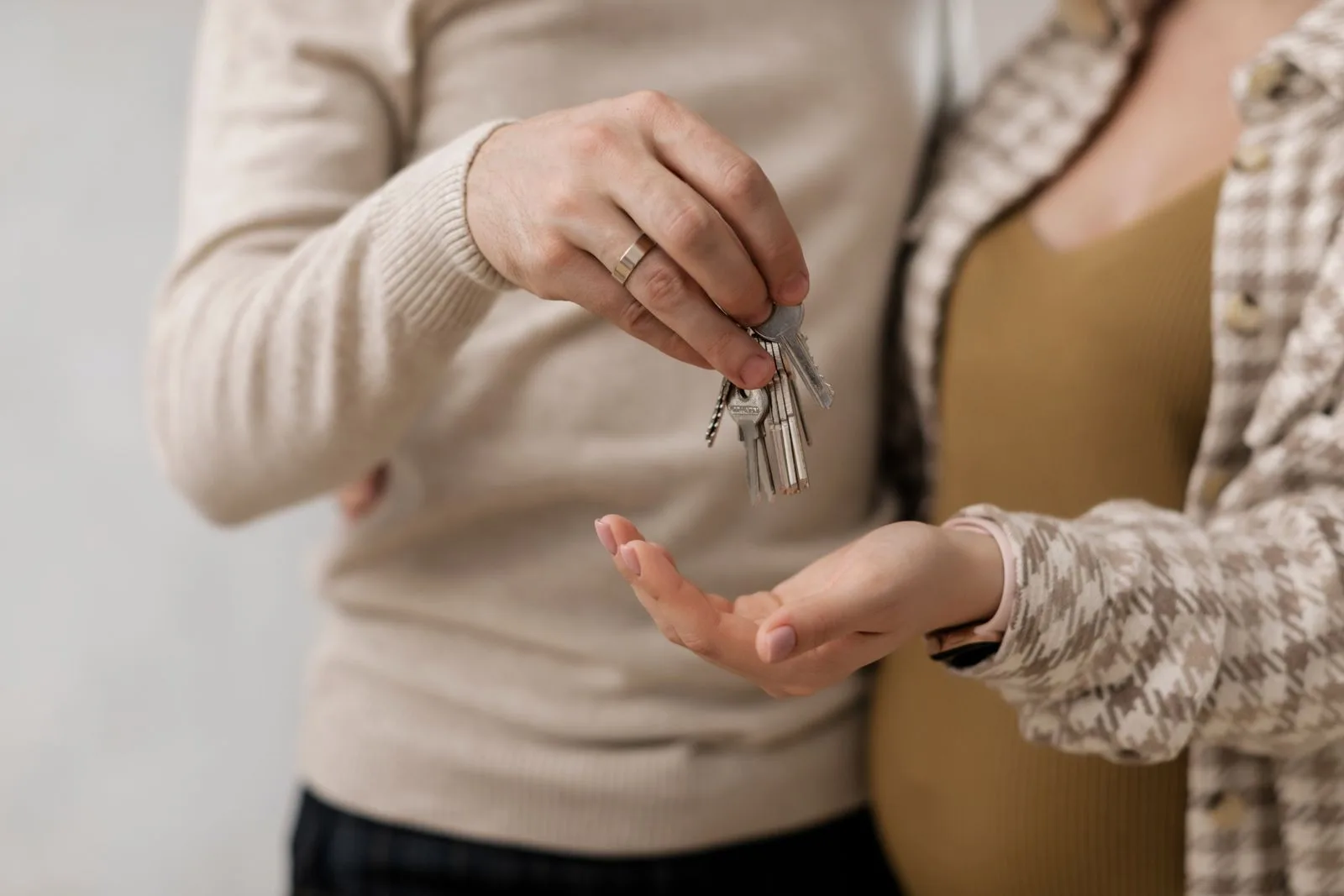 Couple holding the keys to their new home